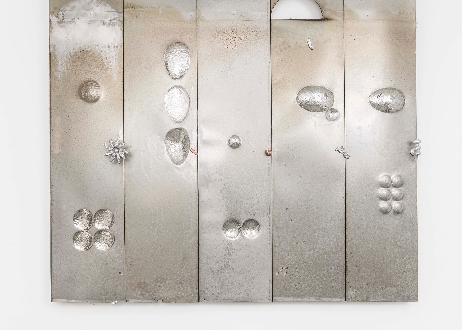Coulisse: Matti Sumari, The baker's oven bakes itself, 2023, 250 cm x 56 cm (per panel), stainless steel from illegal catering operation, copper, bronze, aluminium, cast with metals from dump sites in Malmö. Courtesy of the artist.